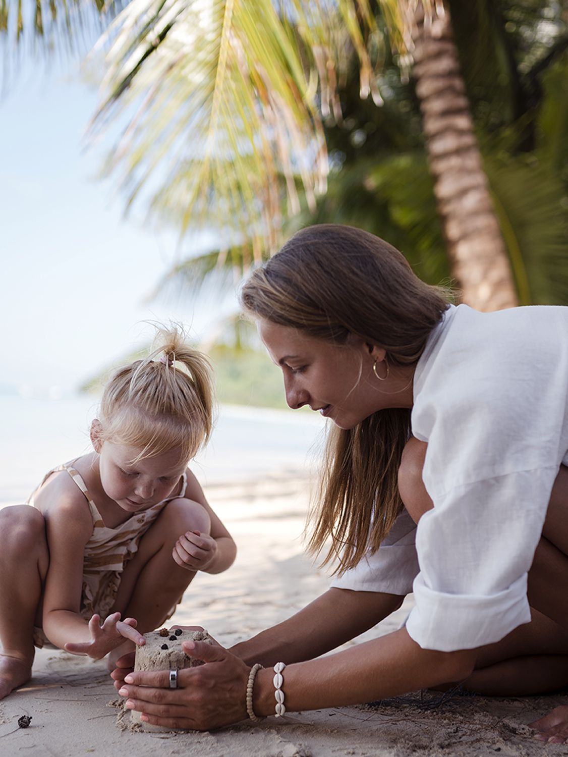 Mother and child by the sea